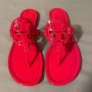 Tory Burch Neon Pink Miller Patent Leather Thong Sandals.